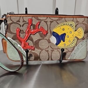 Coach EUC Fish/Coral Suede And Signature Wristlet